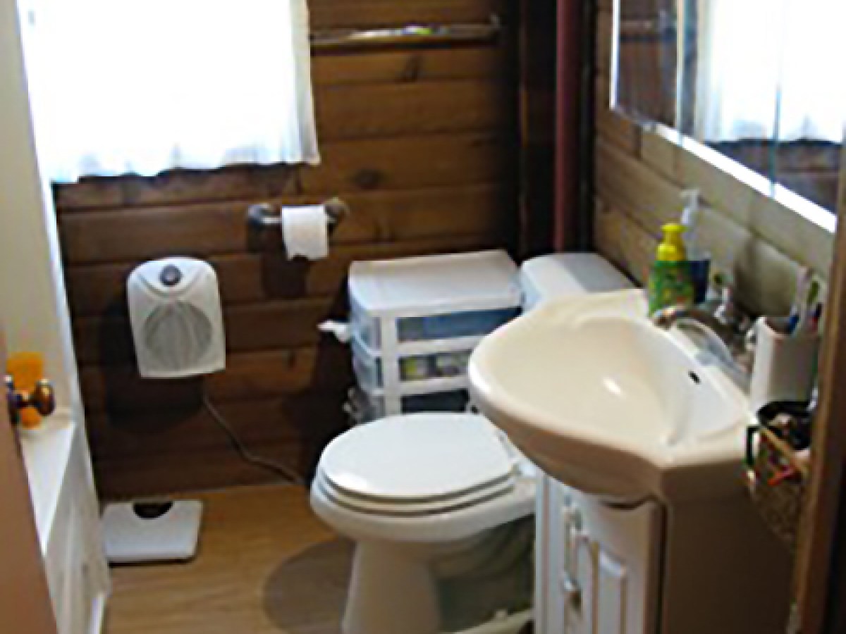 a room with a sink and a window