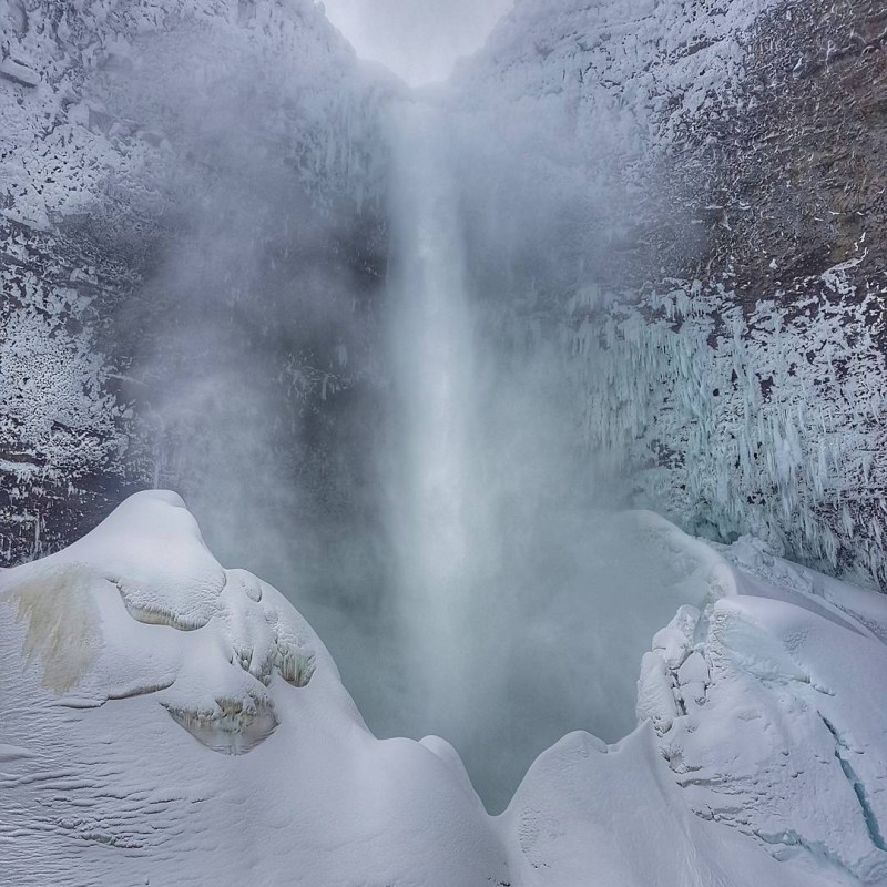 a fire hydrant covered in snow