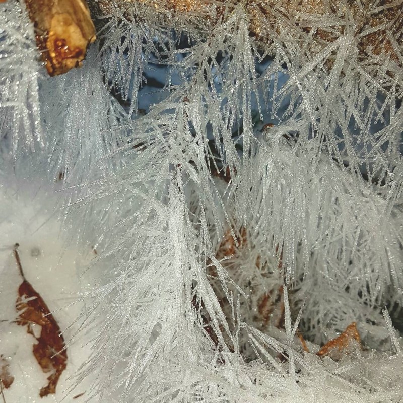 a close up of a snow covered ground