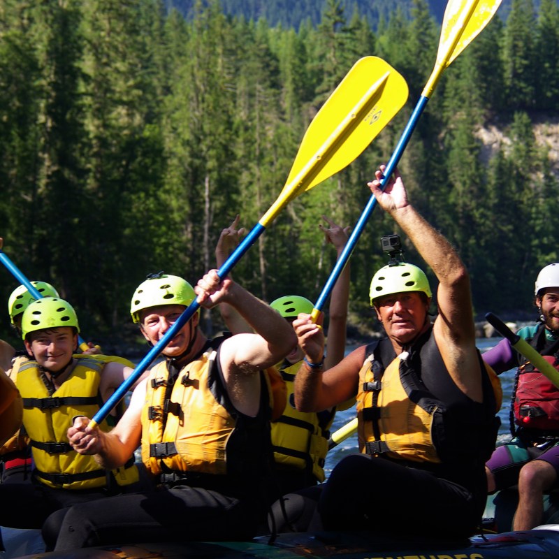 a group of people on a raft