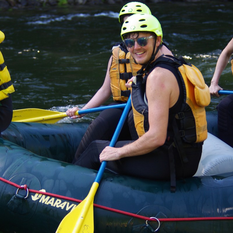 a group of people on a raft