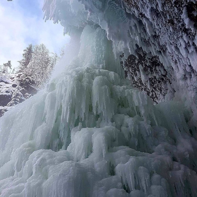 a waterfall in the snow