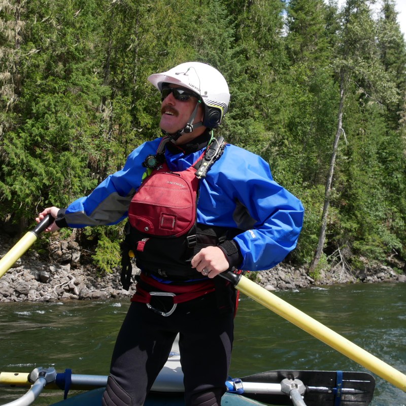 a person rowing a boat in the water