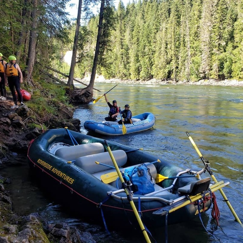a group of people on a boat in the water
