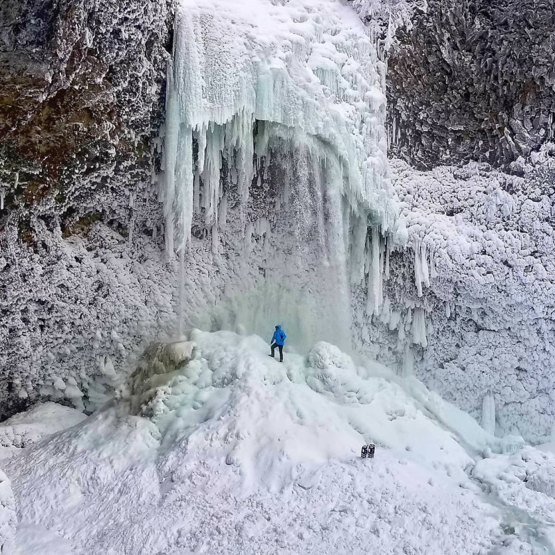 a waterfall in the snow