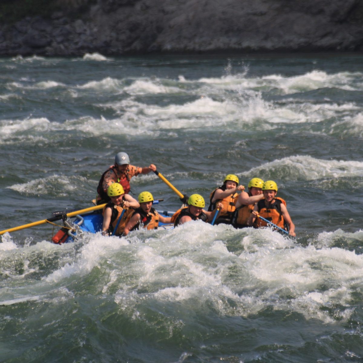 a man riding a wave on top of a body of water
